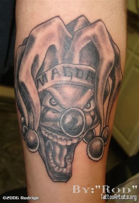 clown sleeve tattoo on arm