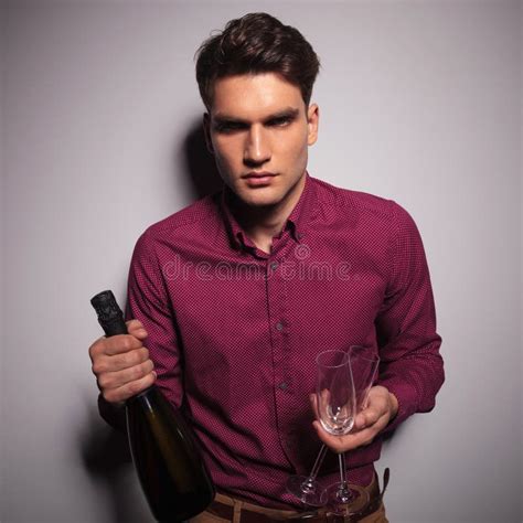 Man Holding A Bottle Of Wine And Two Glasses Stock Photo Image Of