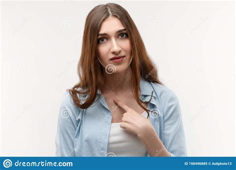 Portrait Of Surprised Brunette Girl Pointing Finger At Herself Face Expression Negative