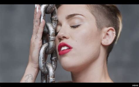 miley cyrus gets completely naked while riding a wrecking ball in her newest music video