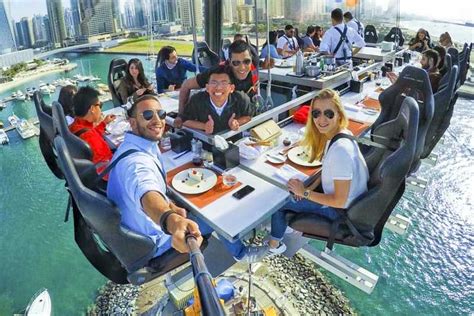 Dubai Opplev Dinner In The Sky Getyourguide