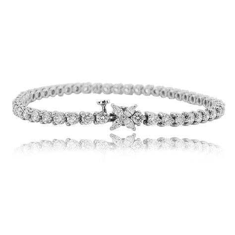 Platinum diamond line tennis bracelet by tiffany & co from victoria collection. Tiffany & Co Diamond Tennis Bracelet