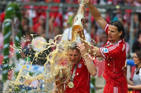 Bayern Munich stars showered in beer on the pitch after winning
