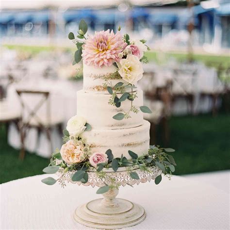 Take your layered wedding cake to the next level by choosing a gorgeous array of flowers and placing them in a cascading manner down the front of it. 27 Pretty Wedding Cakes That Are Ready for Spring