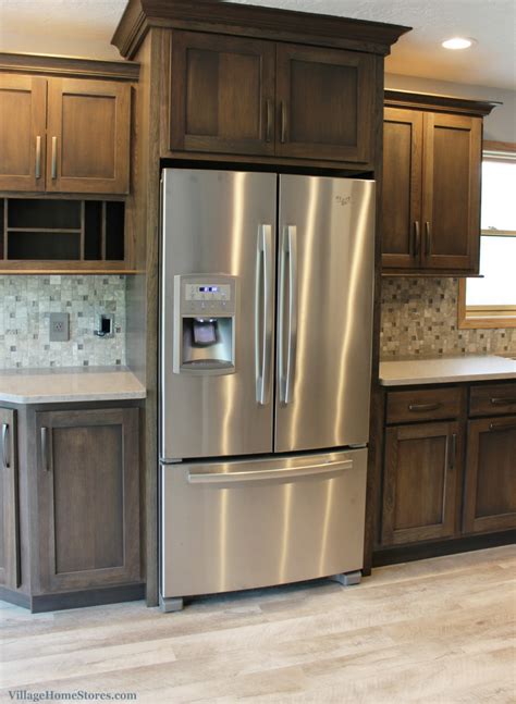 Rated 4.7 out of 5 for gun safes4835. A gray hickory stained Bettendorf, IA galley kitchen ...
