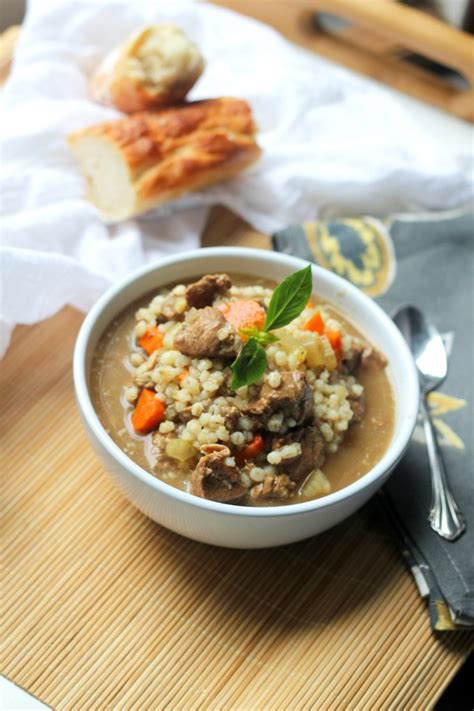 A simple beef barley soup made in the instant pot (or slow cooker.) the beef is tender and the veggies and barley are perfectly cooked. Beef Barley Soup - Gather for Bread