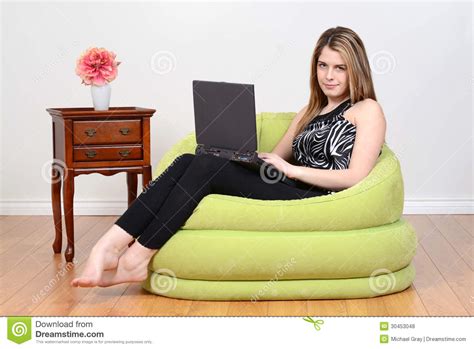 Teen Girl Relaxing With Laptop Royalty Free Stock Photos