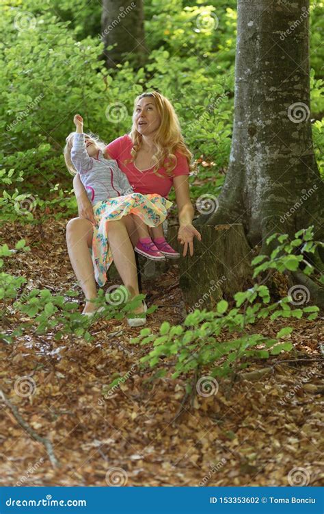 Mother And Daughter Moment Inside The Forest Smilling And Having A