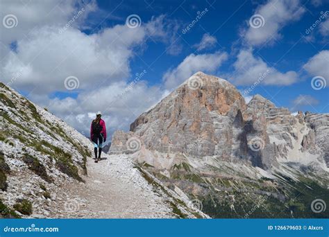 Woman Walking In Dolomite Mountains Stock Image Image Of Nuvolau