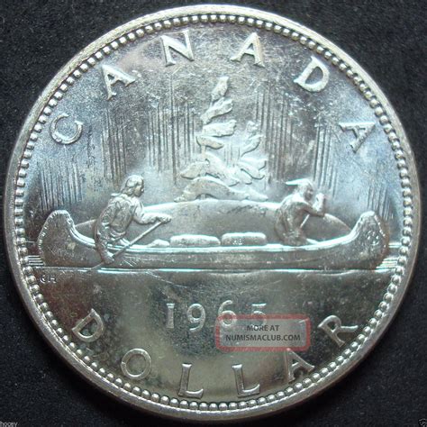You can drive yourself batty going through pocket change trying to figure out which dimes are worth the big bucks. 1965 Canada Silver Dollar Coin