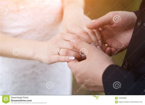 Young Married Couple Holding Hands Ceremony Wedding Day Stock Photo