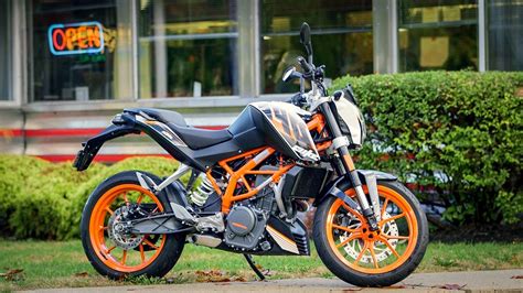 The general design of the motorcycle is aggressive and sharp because it is predicated on its elder sibling, the 1290 super duke r. 2015 KTM 390 Duke Review - RevZilla
