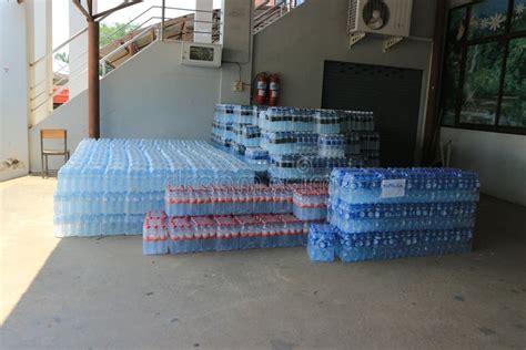 Rows Of Plastic Water Bottles Stacked In Bulk For Sale Stock Photo