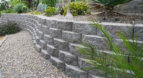 Rather than messing around with mortar, they lay the walls down like lego once the concrete sets up, you can either wait for the paper to biodegrade, peel it off, or burn it off. Sandstone Retaining Walls Brisbane | SANDSTONE PAVERS &TILES