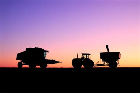 Harvest Sky A Combine And Tractor Backlit By The Morning L Flickr