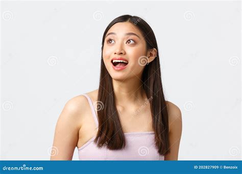 Beauty Fashion And People Emotions Concept Surprised And Happy Smiling Asian Girl In Dress