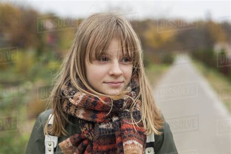 Portrait Confident Tween Girl In Scarf Stock Photo Dissolve