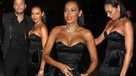 Mel B Struggles To Contain Her Eye Popping Cleavage In Sexy Black Dress