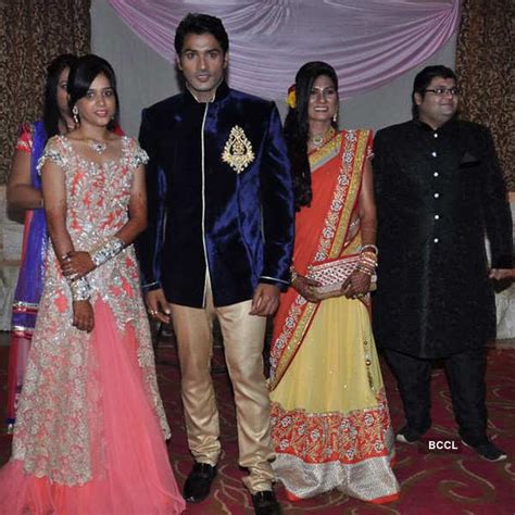sweety jain and mrunal jain pose with guests snapped during their engagement ceremony held in