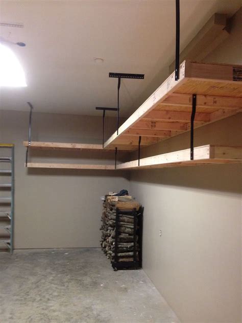 Garage Workshop Garage Shelves Using 2x4s Plywood And Wrought Iron