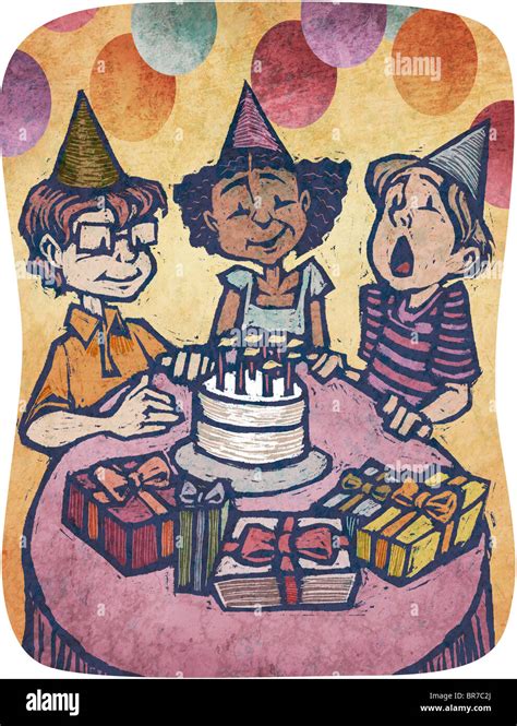 A Boy Blowing Out Candles On A Cake At A Birthday Party Stock Photo Alamy
