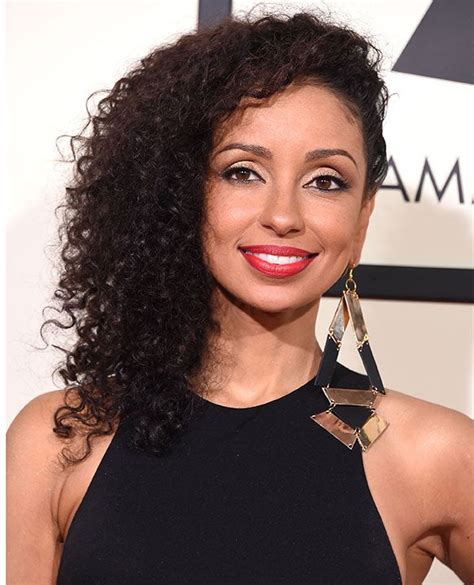 mya traded in her curls for twists and we re obsessed essence