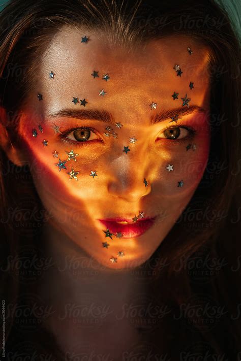 Headshot Portrait Of Amazing Girl With Silver Stars On Her Face By