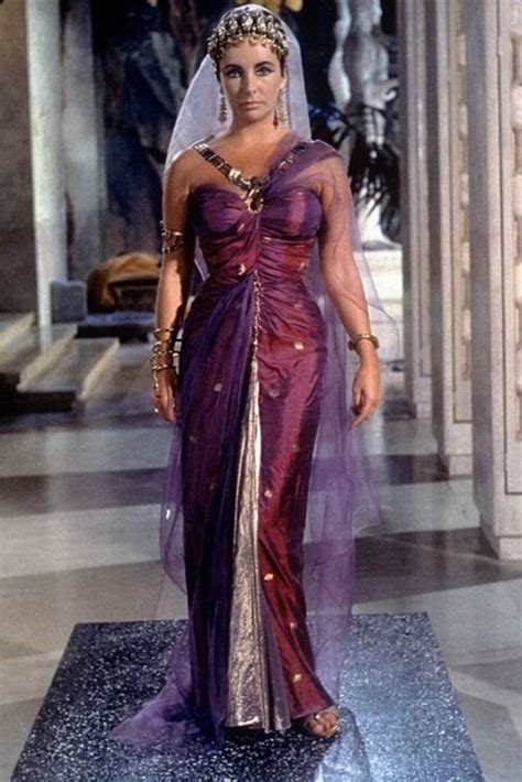 Elizabeth Taylor Wearing Purple Garb In The 1963 Cleopatra Film Elizabeth Taylor Cleopatra