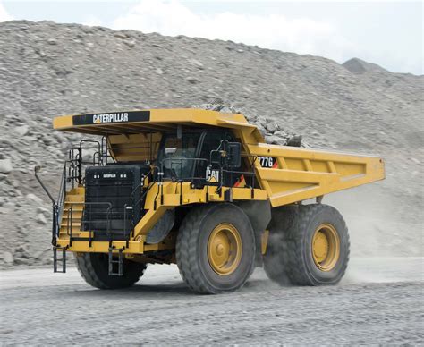 One of peed equipment company's cat 5130b excavators along with fleet of 777f haul trucks working on large housing development project in southern california. NEW 777G OFF HIGHWAY TRUCK: FEATURESG