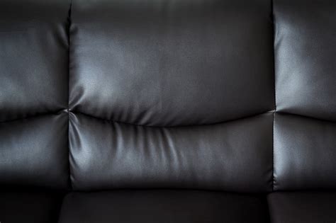 Premium Photo Close Up Black Leather Sofa And Textured And Background With Space