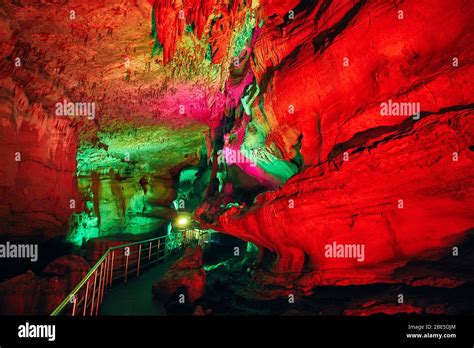 Underground Cave Sataplia With Colorful Red Illumination In Kutaisi