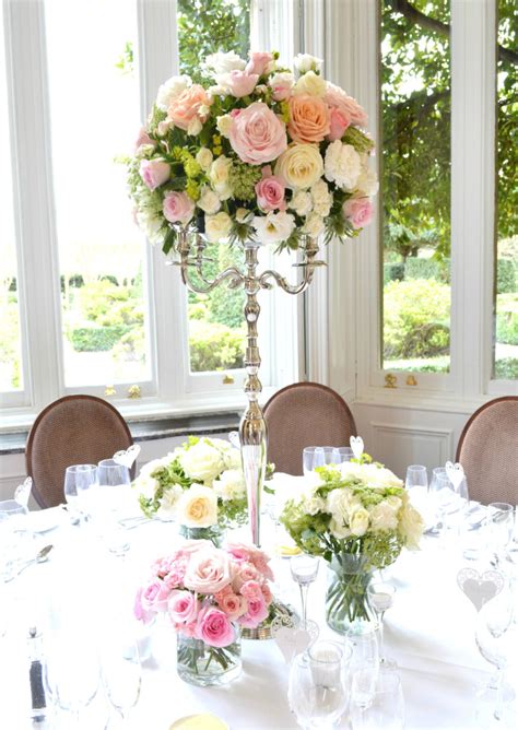 These are an artful and unique way to use flowers at your wedding and reception. Fawsley Hall Wedding Flowers and Cake | Chérie Kelly