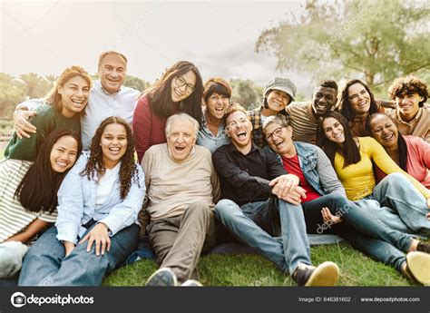 Happy Multigenerational People Having Fun Sitting Grass Public Park