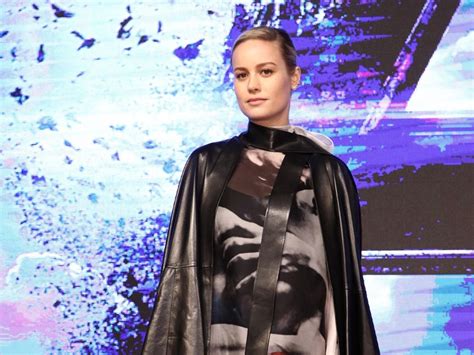 Brie Larson Wears A Custom Valentino Gown And Cape To The Premiere Of