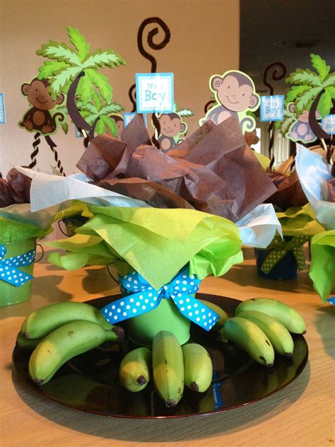 Personalized party favors, cakes, banners and table decor all for the special baby coming soon. Babyshower centerpiece for boy monkey theme LYNETTES ...