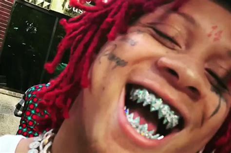 Trippie Redd Shows Off 50000 Blue Diamond Fangs Grill Trippie Redd