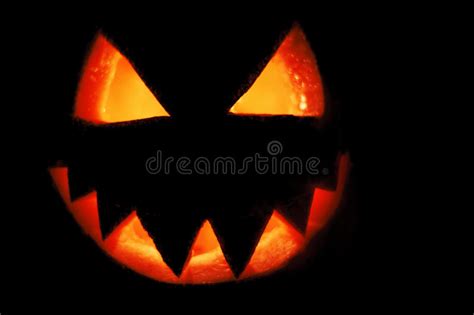 Pumpkin Carved Into Spooky Demon Face For Haloween Stock Image Image