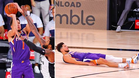 Look at devin booker's face in the photo above. NBA: Devin Booker buzzer beater gives Phoenix Suns win ...