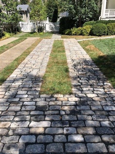Salvaged Regulation Granite Cobblestone Used To Create A Driveway For A