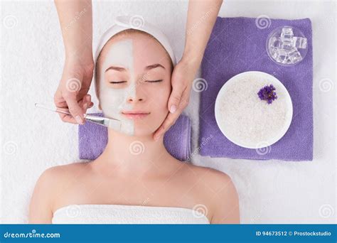 Woman Gets Face Mask By Beautician At Spa Stock Photo Image Of