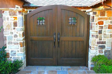 If frost is not a factor in your region, a depth of 30 inches should be enough to support a gate. Evens Construction Pvt Ltd: Compound Walls and Gates