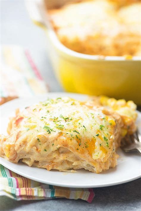 Chicken enchilada casserole filled with chicken breast, black beans, and corn then smothered in enchilada sauce and cheese is so much easier to make than traditional enchiladas. Easy Chicken Enchilada Casserole with Cheese ...
