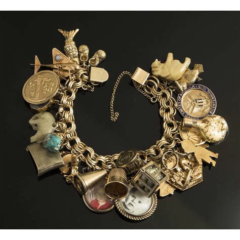14k Gold Charm Bracelet Witherells Auction House