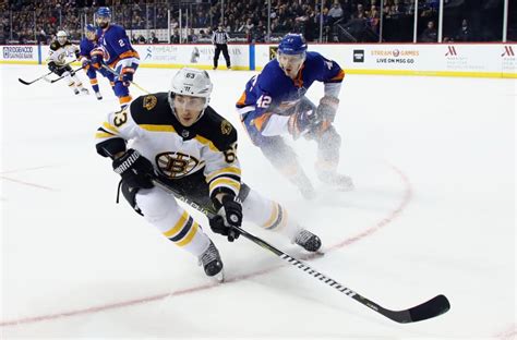Boston Bruins Have A Night Brad Marchand Bs Defeat Wings In Ot