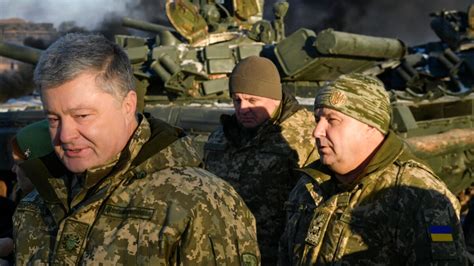Putin Accuses Poroshenko Of Electoral Ploy As Ukraine Imposes Martial