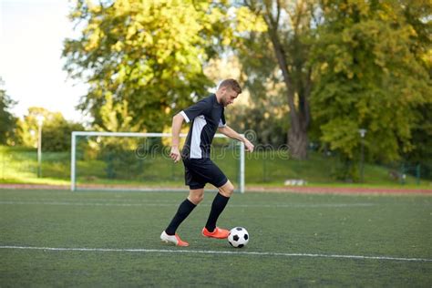 Soccer Player Playing With Ball On Football Field Stock Image Image