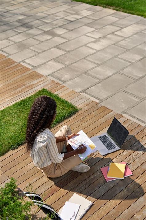 Black Young Woman Student Learning Using Laptop Studying Outside Campus