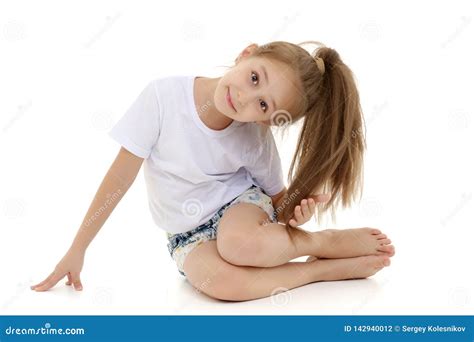 The Little Girl Is On Her Knees Stock Photo Image Of Happy