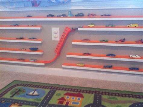 Hot wheels wall tracks auto motion speedway starter set: Hotwheels display. Wood blocks with track and car shoot added. | Hot wheels room, Kids room ...