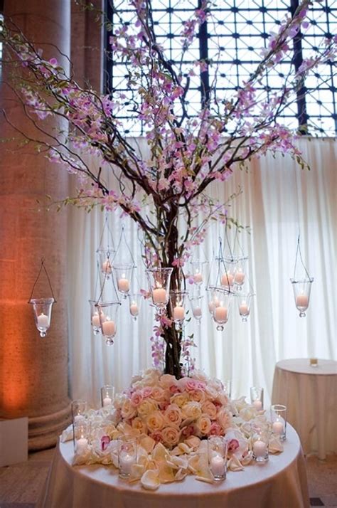 A flower wall would serve as the perfect backdrop for photos with guests, making this décor idea worth the investment. Ceremony Decor Archives - Weddings Romantique